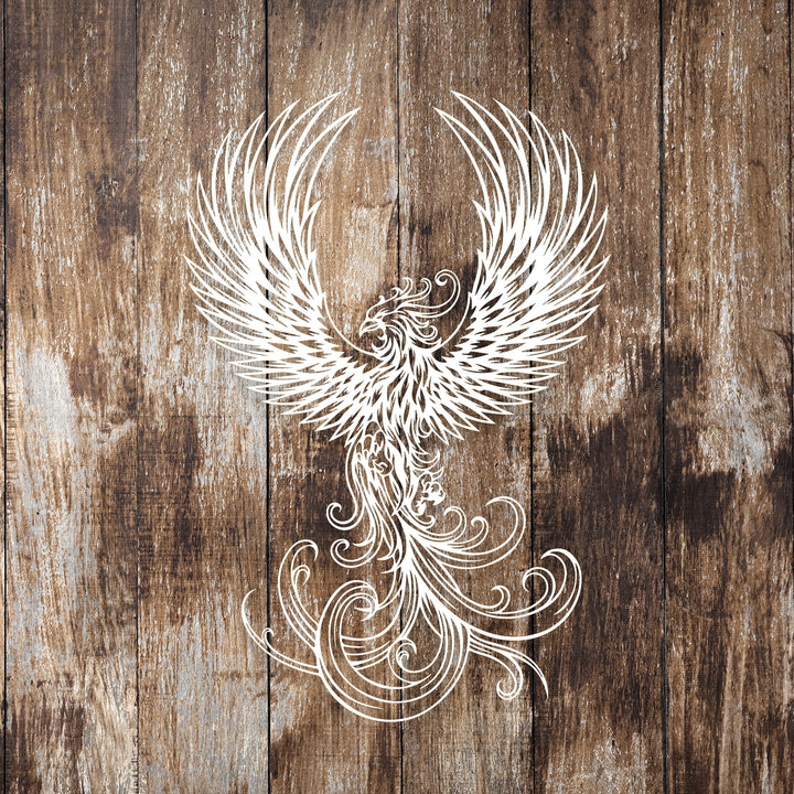 Statement metal wall decor featuring a powerful phoenix design.