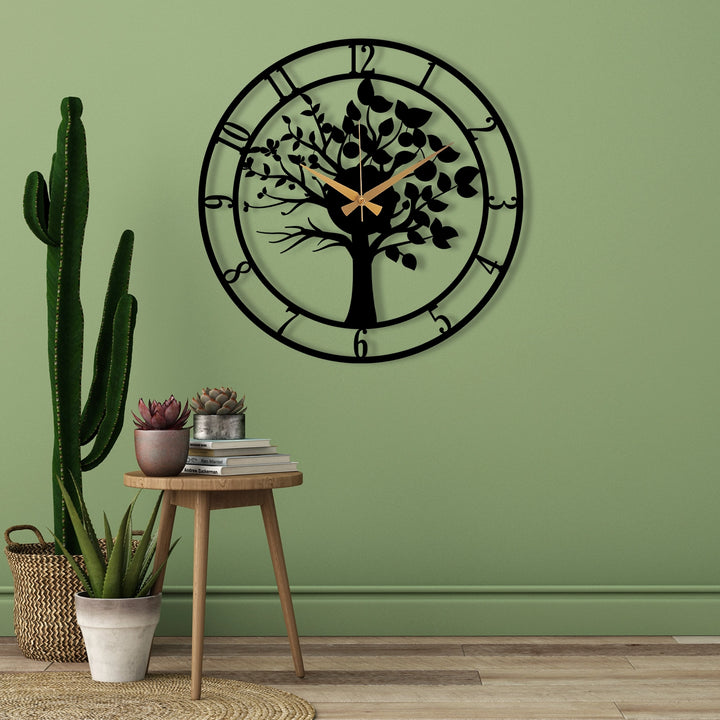 METAL WALL CLOCK WITH TREE DETAIL