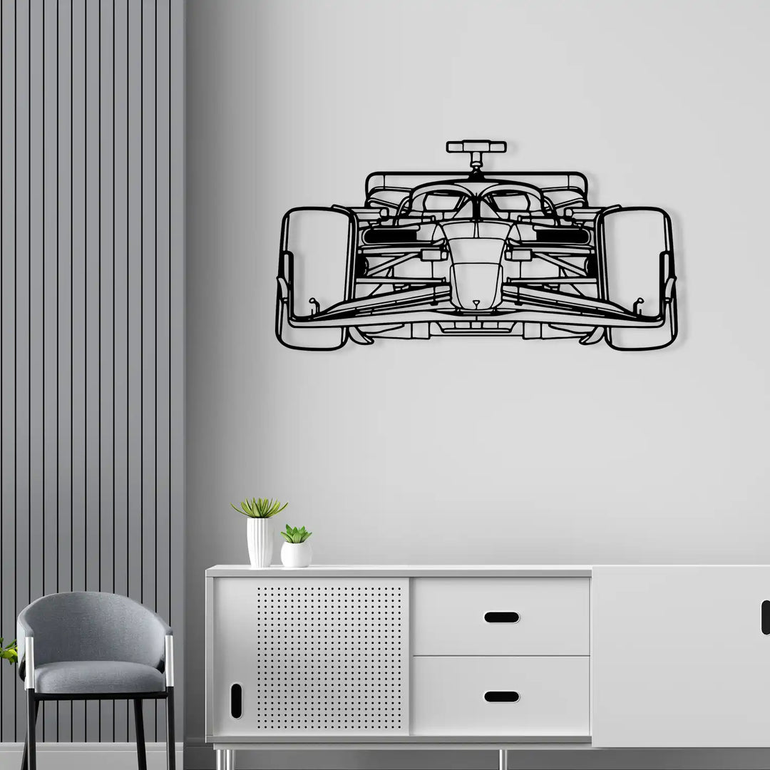 Decorative black metal F1 car art hanging in a motorsport-themed interior.