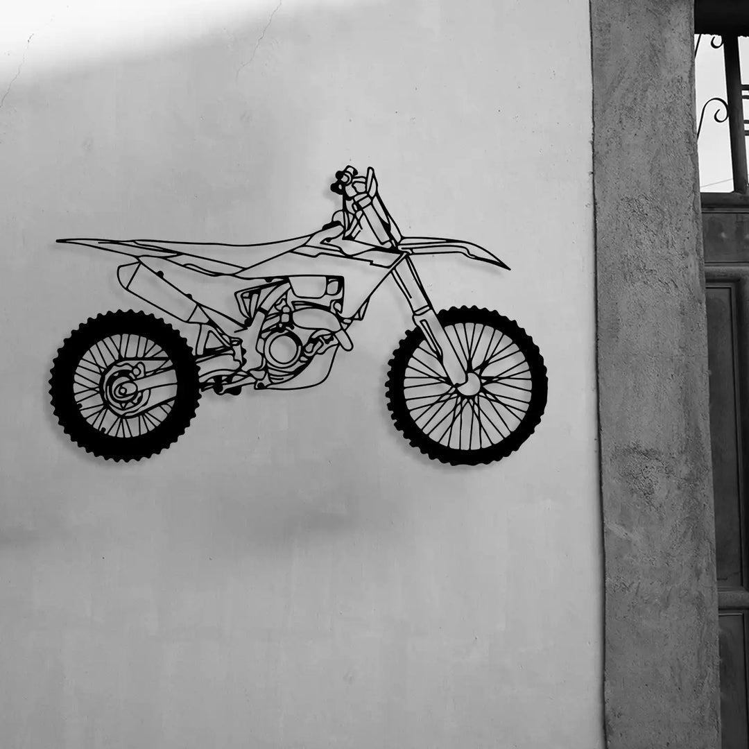 Laser-cut motocross bike design mounted on a clean white background.