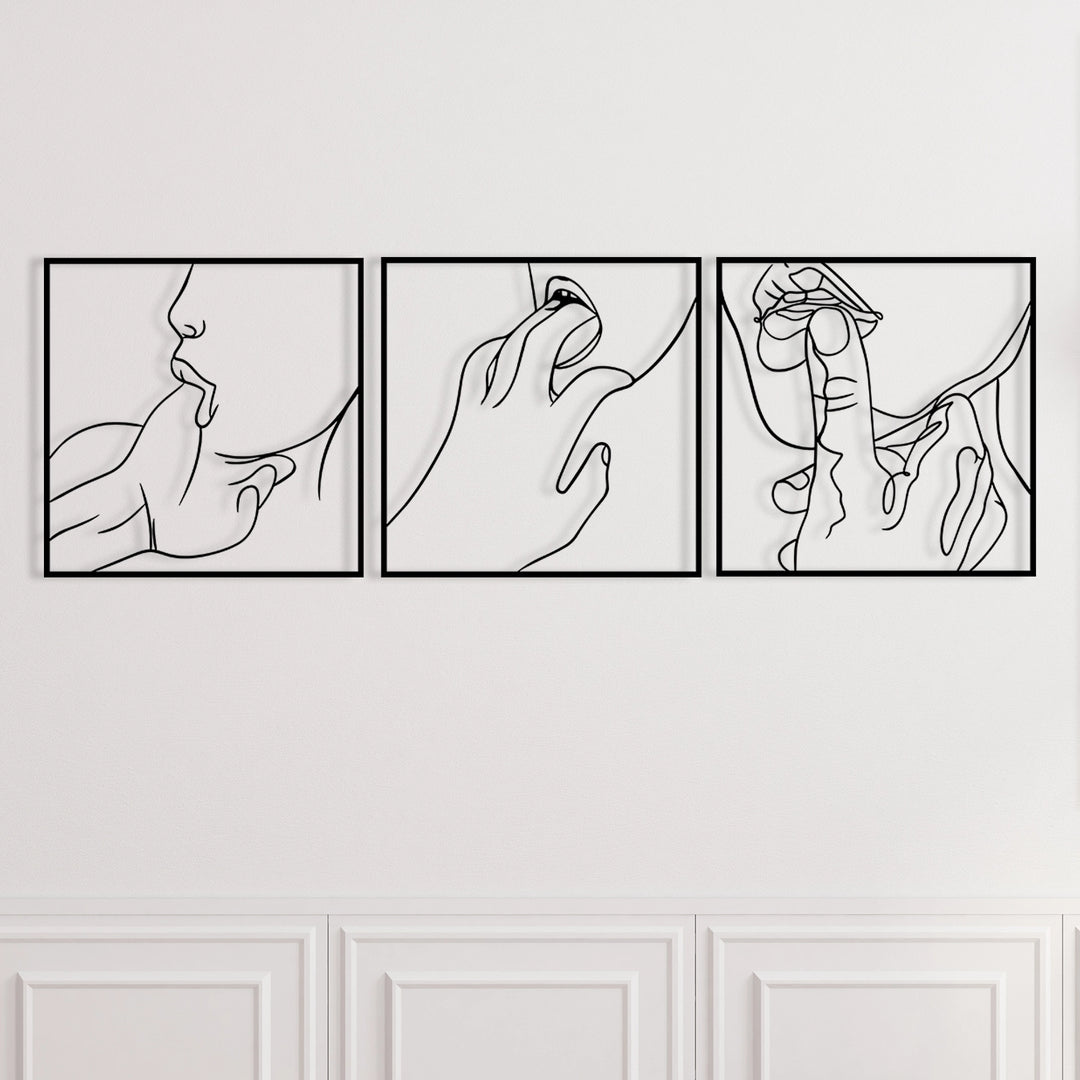 Bedroom wall decor with three black metal panels showcasing sensual line art.