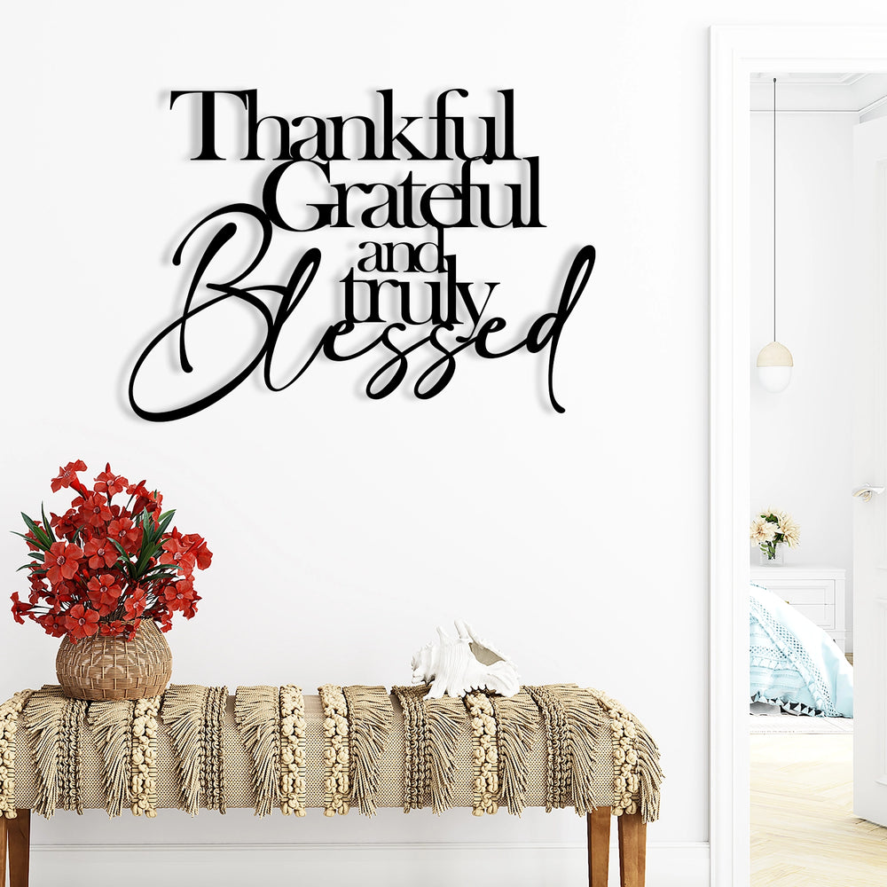 Elegant black metal typography wall decor with gratitude message.