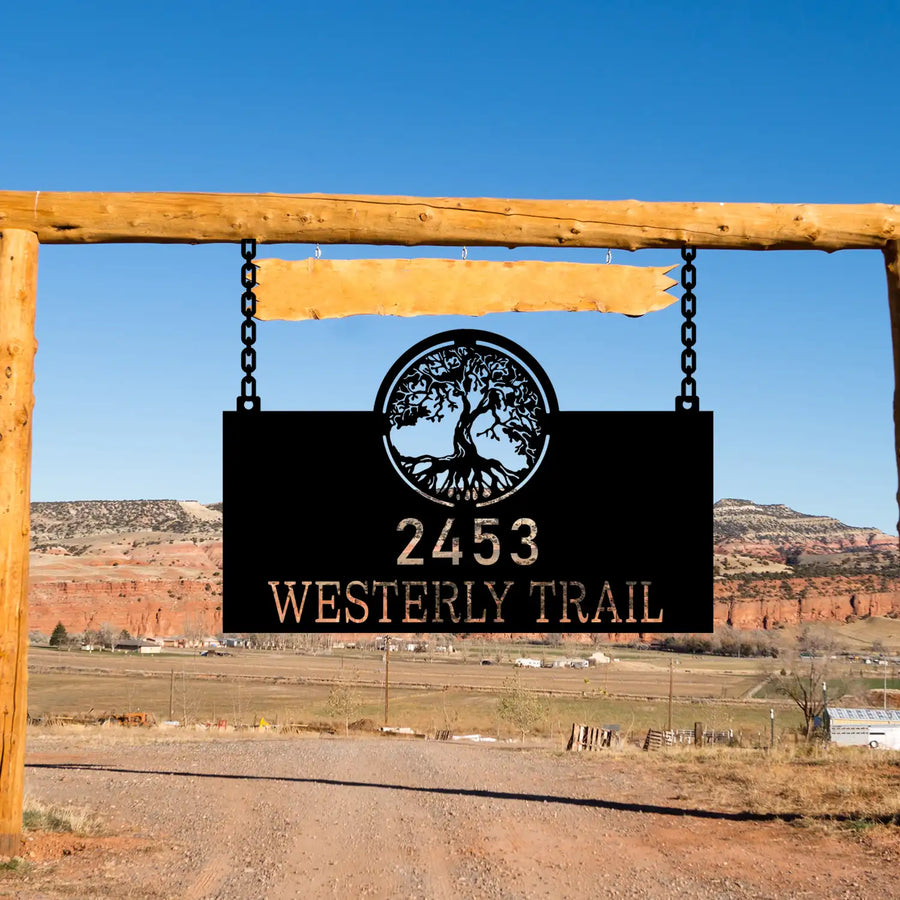 Personalized outdoor address sign for 2453 Westerly Trail, featuring a tree design.