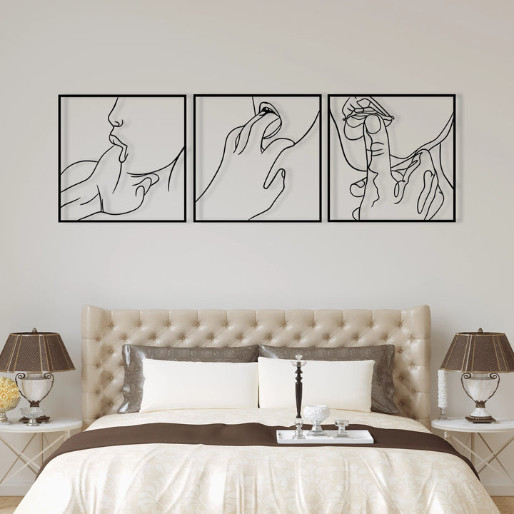 Minimalist black metal line art wall decor with sensual hand and face sketches.