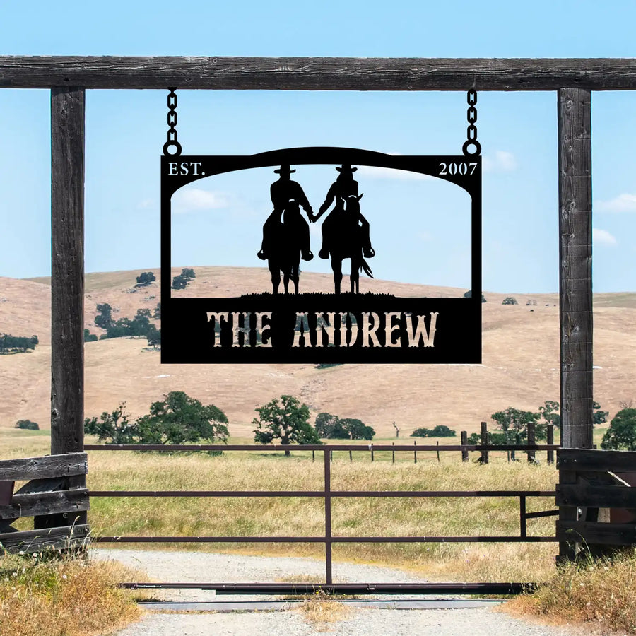 Custom ranch sign featuring two cowboys on horses, established in 2007.