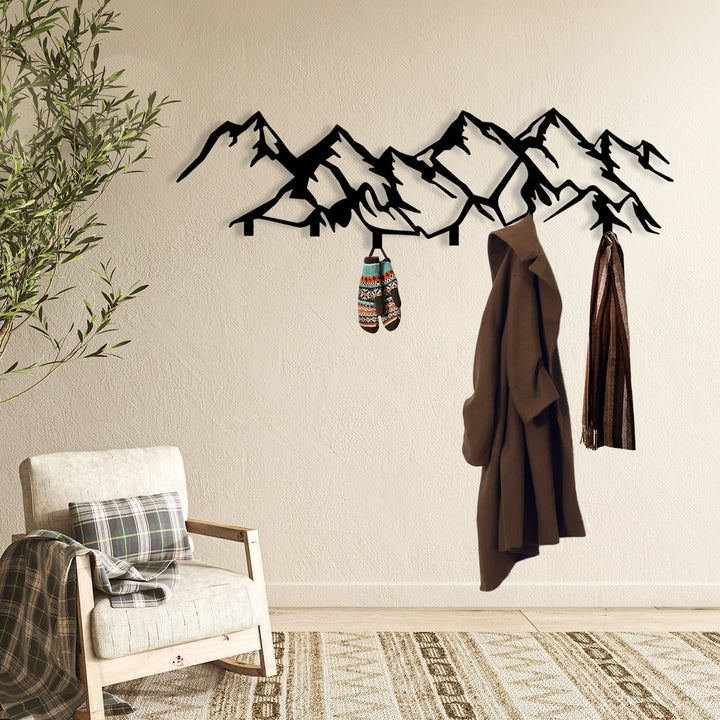 Functional and decorative mountain silhouette wall hook for home.