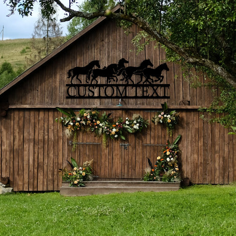 Durable metal garden sign with horse silhouettes.